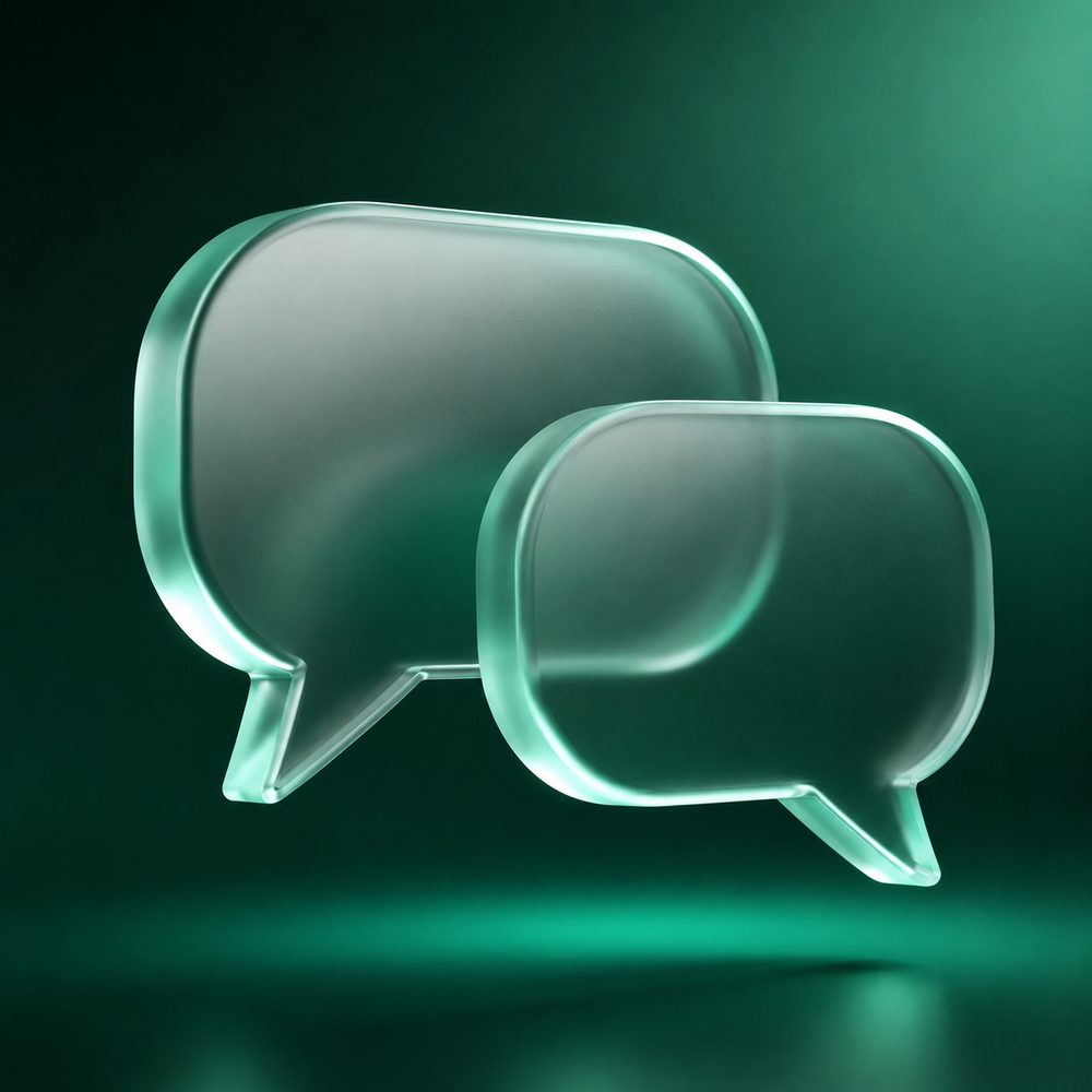 Deux bulles de dialogue en verre translucide, symbolisant la boutique multilingue
